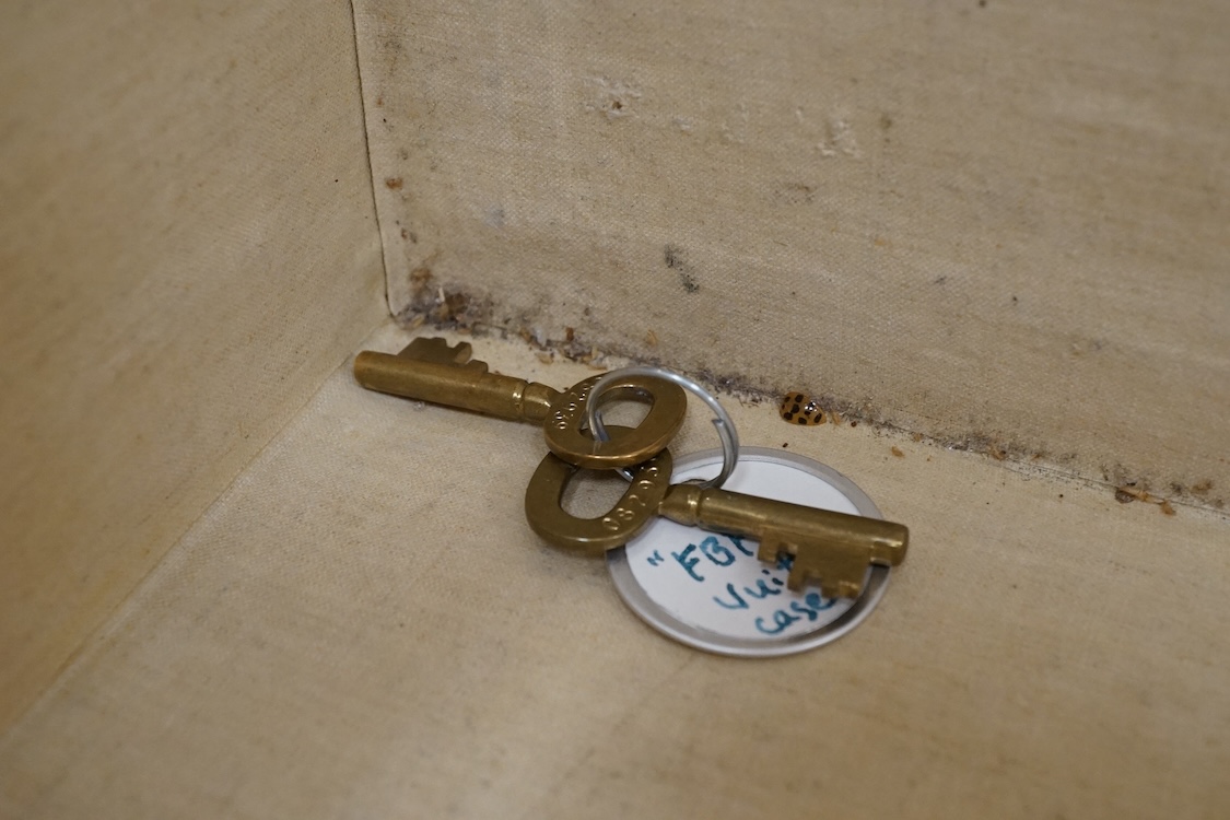 A vintage Louis Vuitton monogram suitcase with two original keys, numbered 793692 to the linen covered interior, height 22cm, width 76cm, depth 46cm